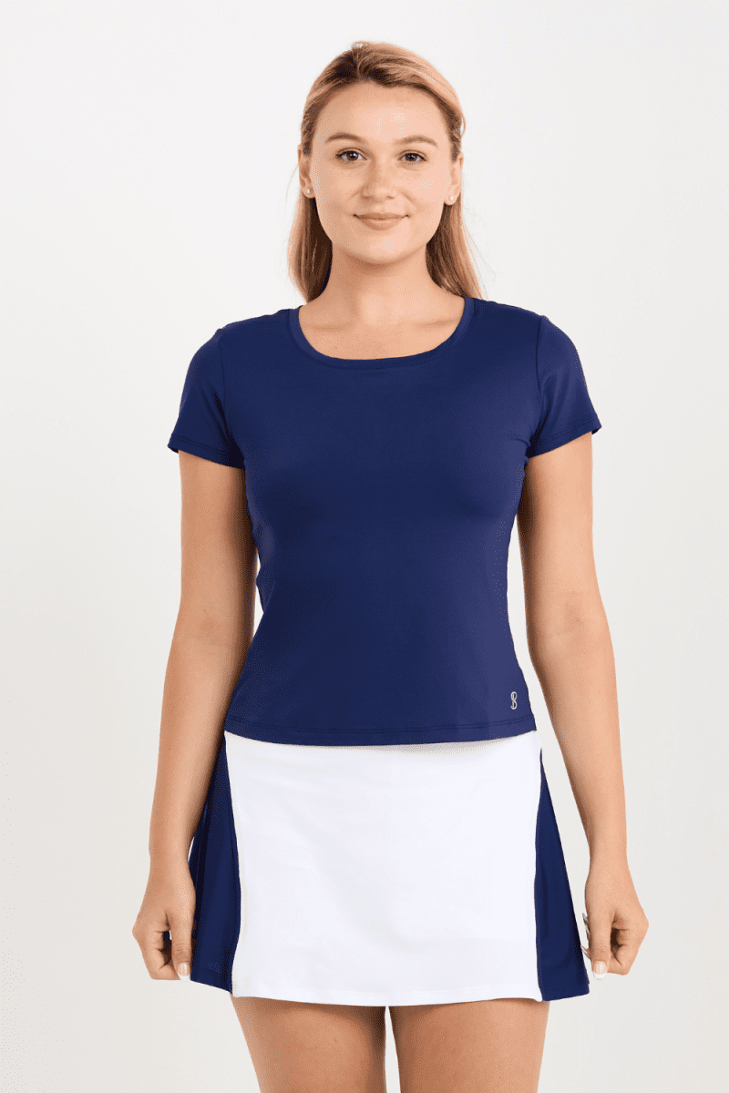 Women's Navy Short Sleeve Tennis Top by Sofibella, front close up view on model