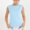 Women's Cloud Blue Cap Sleeve Tennis Top by Sofibella, front close up on model