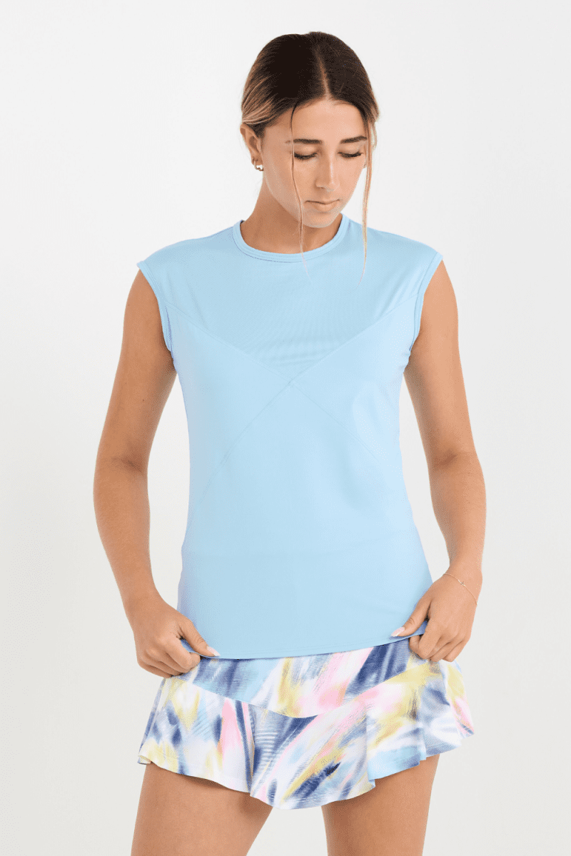 Women's Cloud Blue Cap Sleeve Tennis Top by Sofibella, front close up on model