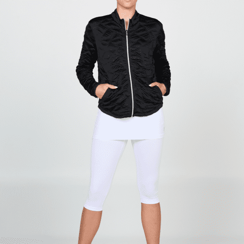 Black quilt jacket with white leggings, front view