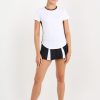 Women's short sleeve tennis top with side shirring in black, front view